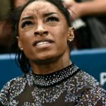 ‘CAN SOMEONE FIX HER HAIR FOR HER PLEASE?!’: Olympics viewers slammed Simone Biles for her hairdo at the competition, but she did THIS HISTORIC THING before their eyes. Details and photos are in the comments below.